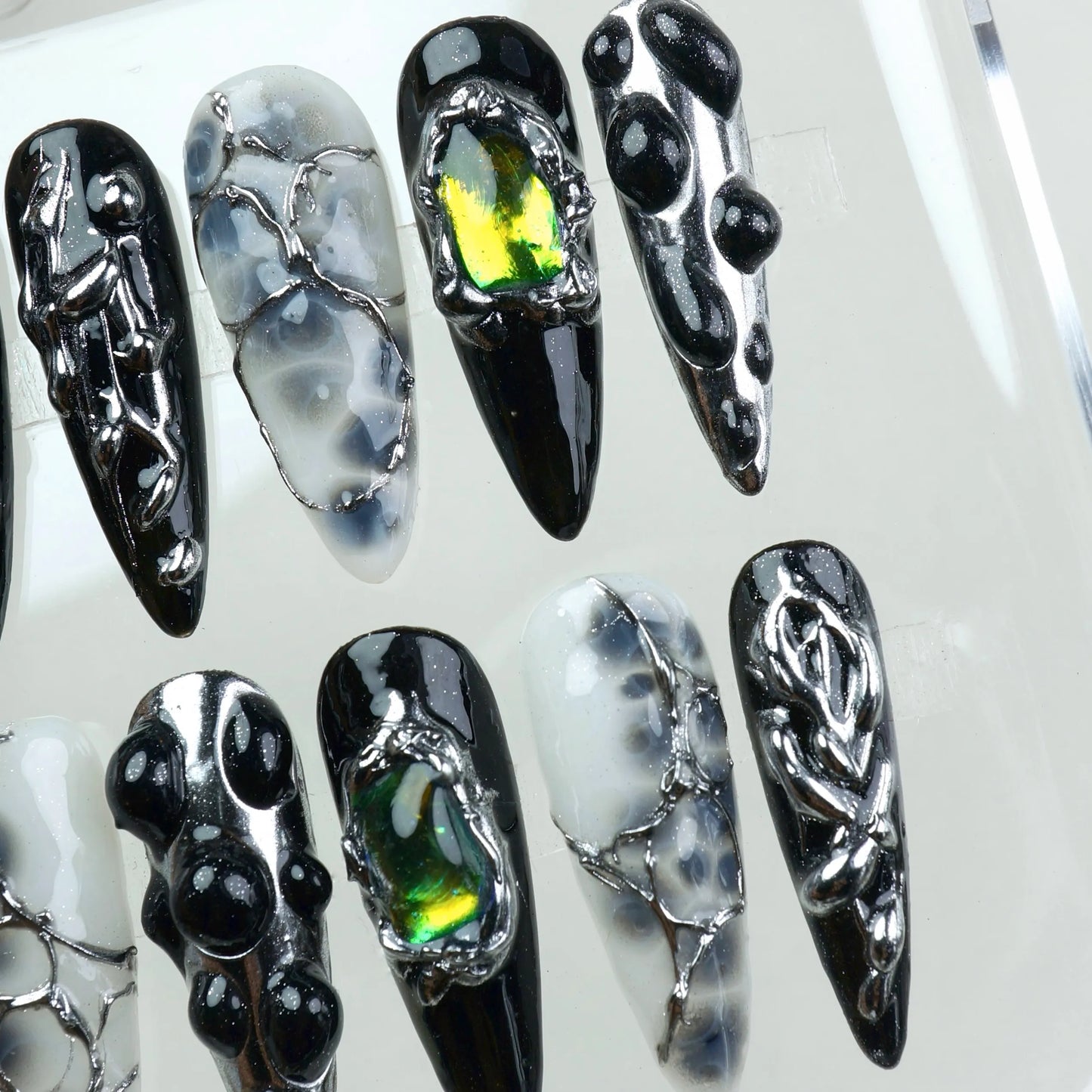 Like sci-fi on your fingertips—these nails drip with attitude, shimmer, and cyberpunk energy.