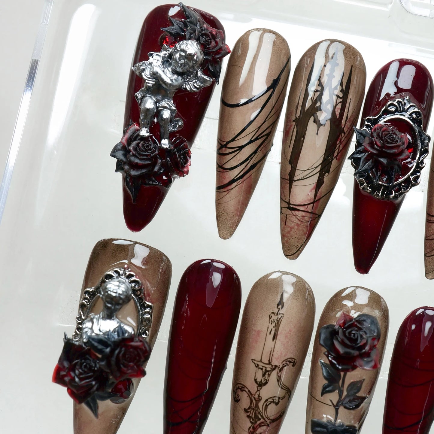 Gothic nails with angel charms, roses, and vintage illustrations – handcrafted by Donailsart.