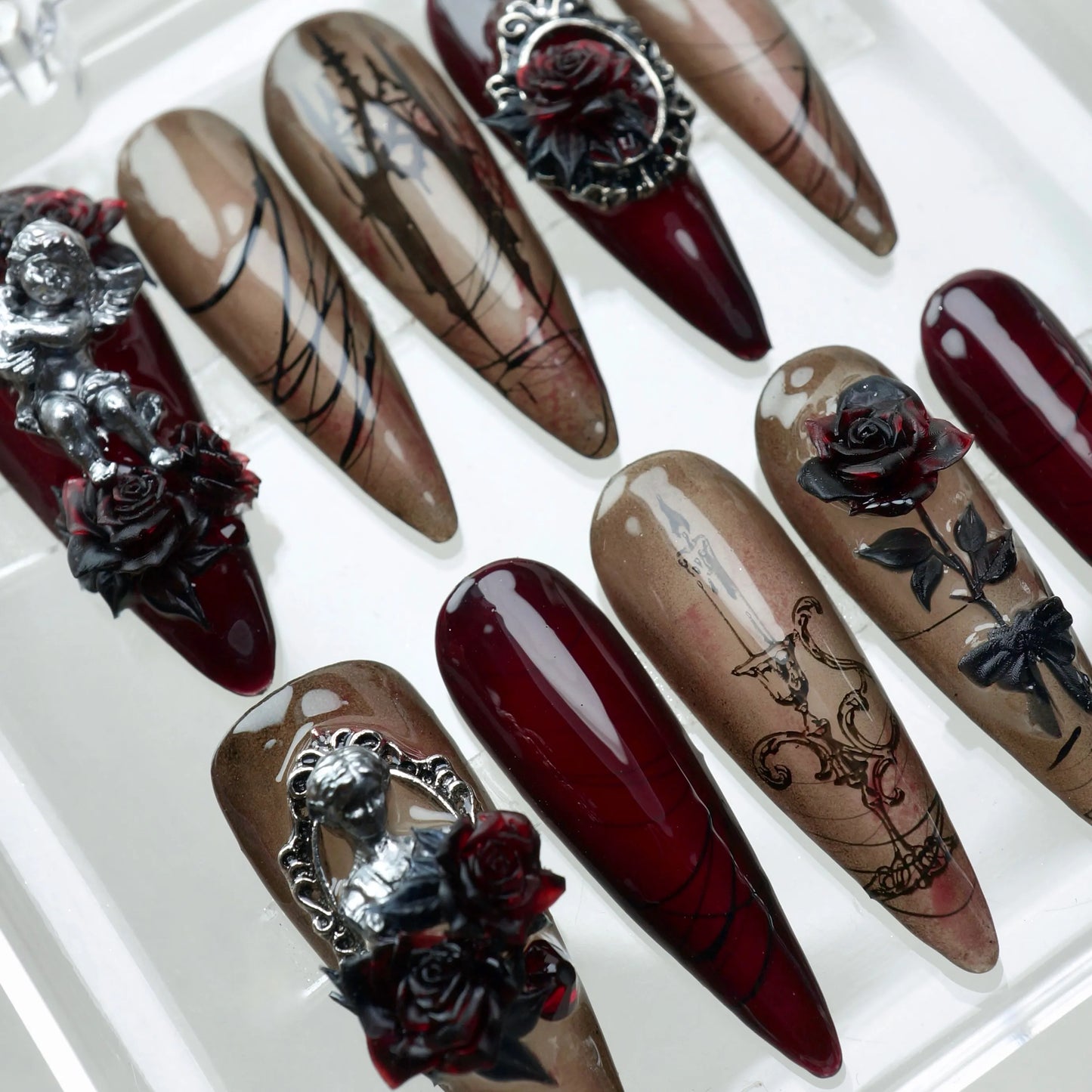 Gothic nails with angel charms, roses, and vintage illustrations – handcrafted by Donailsart.