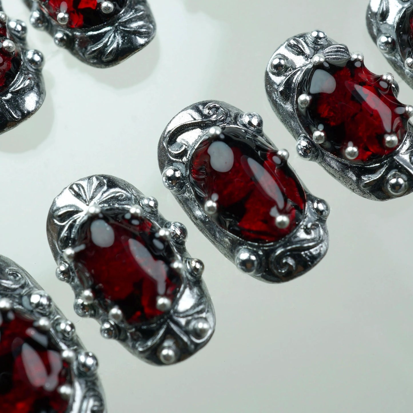 Crimson Jewel nail art side angle – Donailsart