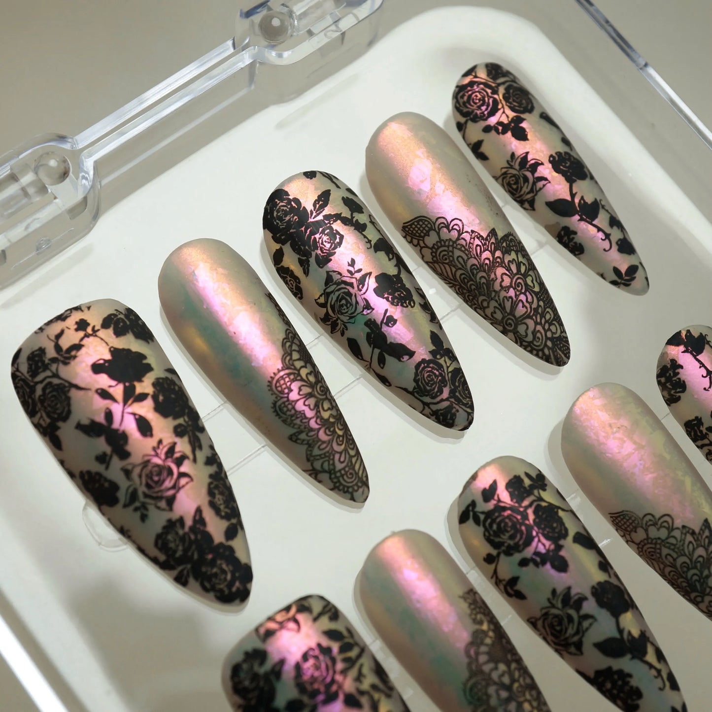 Opaline Veil press-on nail set product view with ethereal iridescent pearl and black lace floral nail art by Donailsart