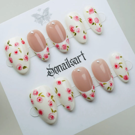A11 | Porcelain Bloom press-on nails on display showing the full nude and rose floral nail art collection – Donailsart