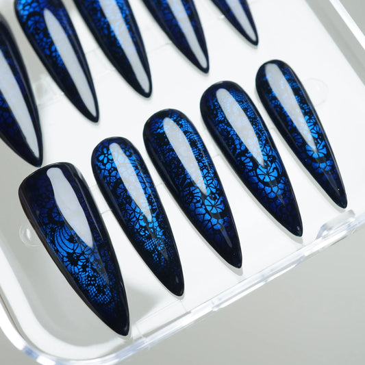 Cobalt Lace press-on nails on display showing the full black and cobalt blue lace-pattern nail art set – Donailsart