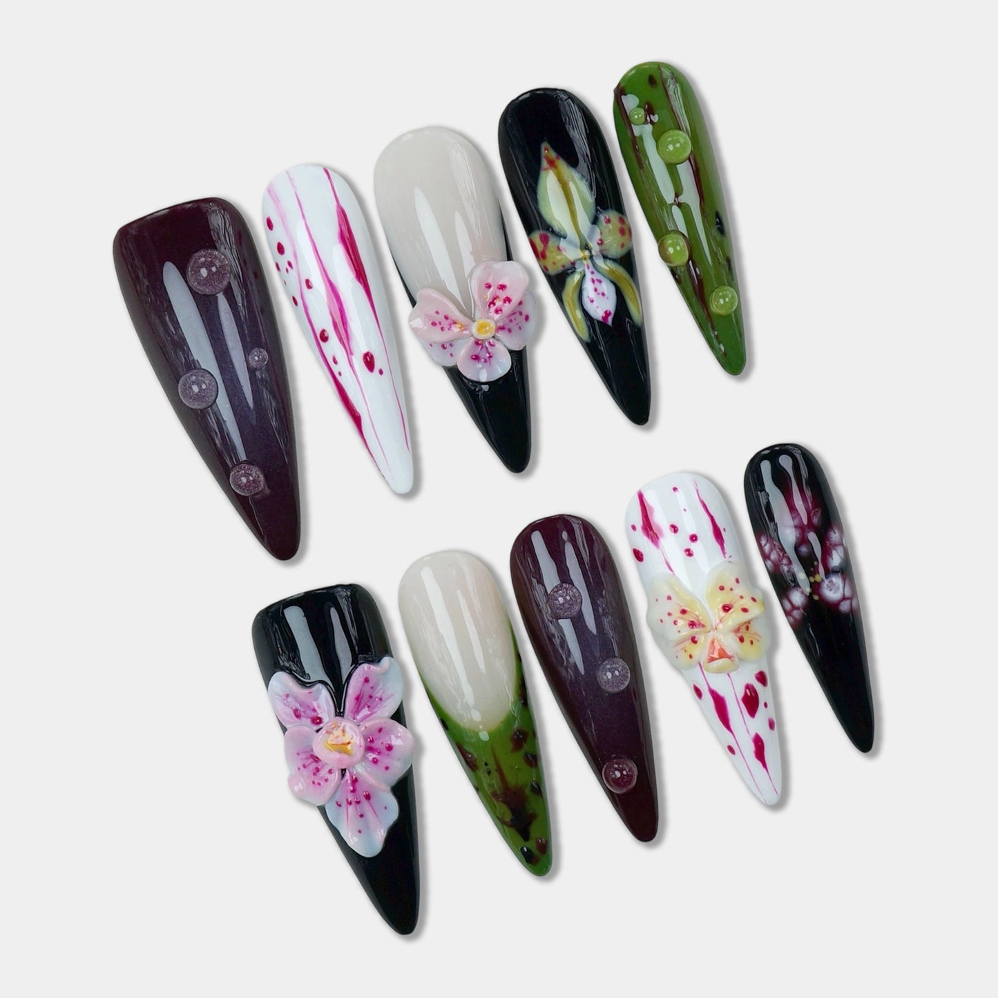Elegant flower design nails with deep wine tones, 3D orchids, and dripping petal art for a bold floral statement