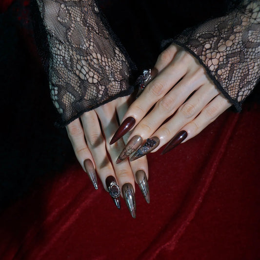 Gothic Rose brown press-on nails with spiderwebs, 3D black rose and silver cherub, full set on hands