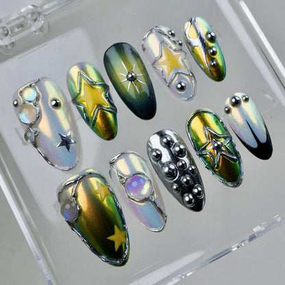 Celestial glam meets futuristic edge—these cosmic nails twinkle with stars, chrome shine, and galactic gemstones.