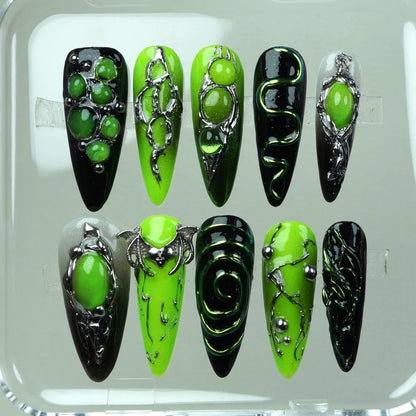 Donailsart press-on nails featuring slime green gradients, galactic swirls, and extraterrestrial chrome patterns

