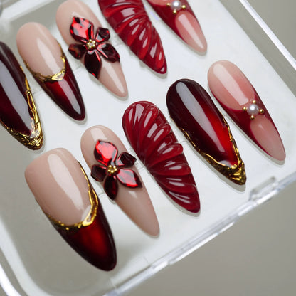 Ruby Poinsettia nail art detail view – Donailsart