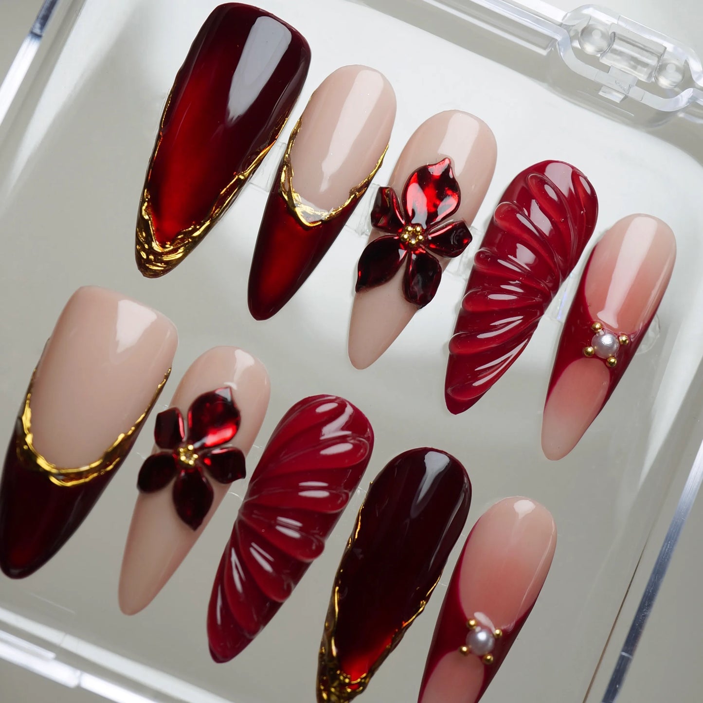 Ruby Poinsettia nail art side angle – Donailsart