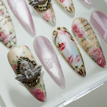 Cherub Relique nail art product view featuring theatrical vintage rose and cherub gold framing nail designs – Donailsart