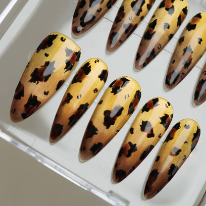 Gilded Wild close-up detail showing rich tortoiseshell leopard pattern over a molten metallic gold chrome nail – Donailsart