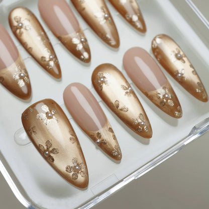 Gilded Whisper nail art detail view featuring muted champagne gold gradient and fine floral nail designs – Donailsart