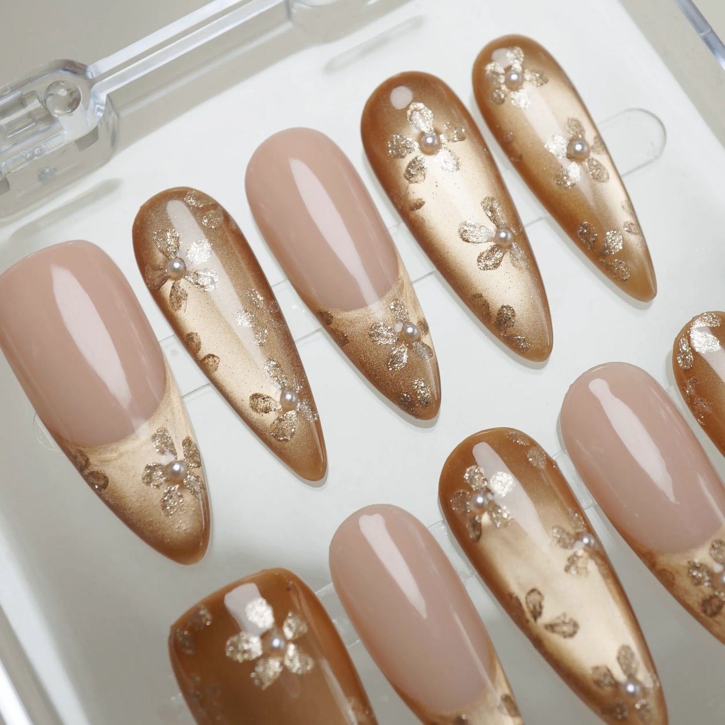 Gilded Whisper press-on nail set product view with heirloom-inspired champagne gold gradient and pearl floral nail art by Donailsart
