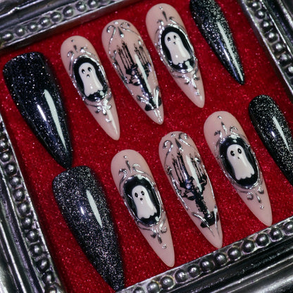Midnight Cameo press-on nails, close-up of silver cameo ghost art