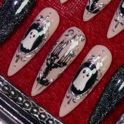 Midnight Cameo press-on nails, detail shot of silver cameo ghost art