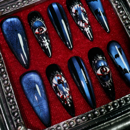 Azure Nightmare press-on nails, close-up of framed eyeball cameos