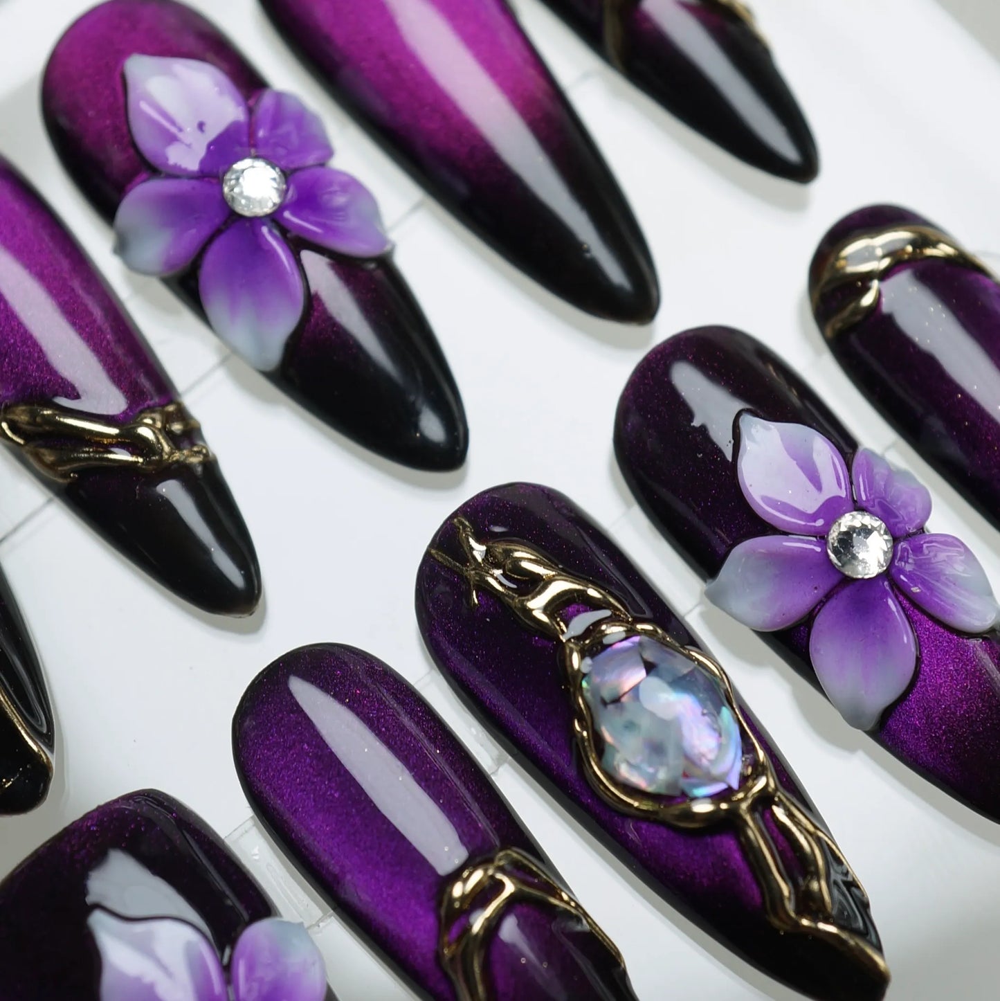 Veloria nail art product view featuring rich deep purple to black gradient with flowing gold frame nail designs – Donailsart