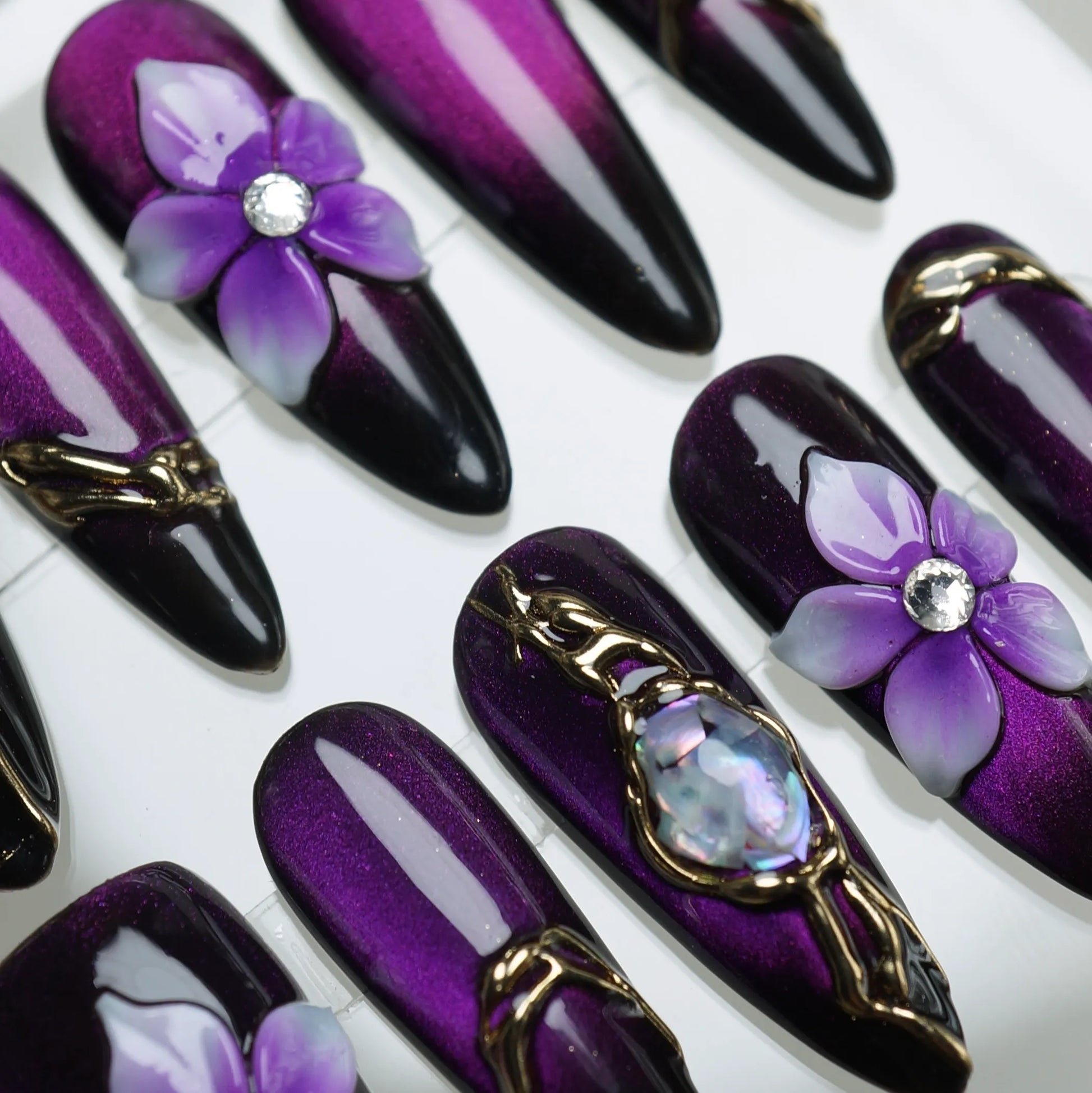 Veloria nail art product view featuring rich deep purple to black gradient with flowing gold frame nail designs – Donailsart
