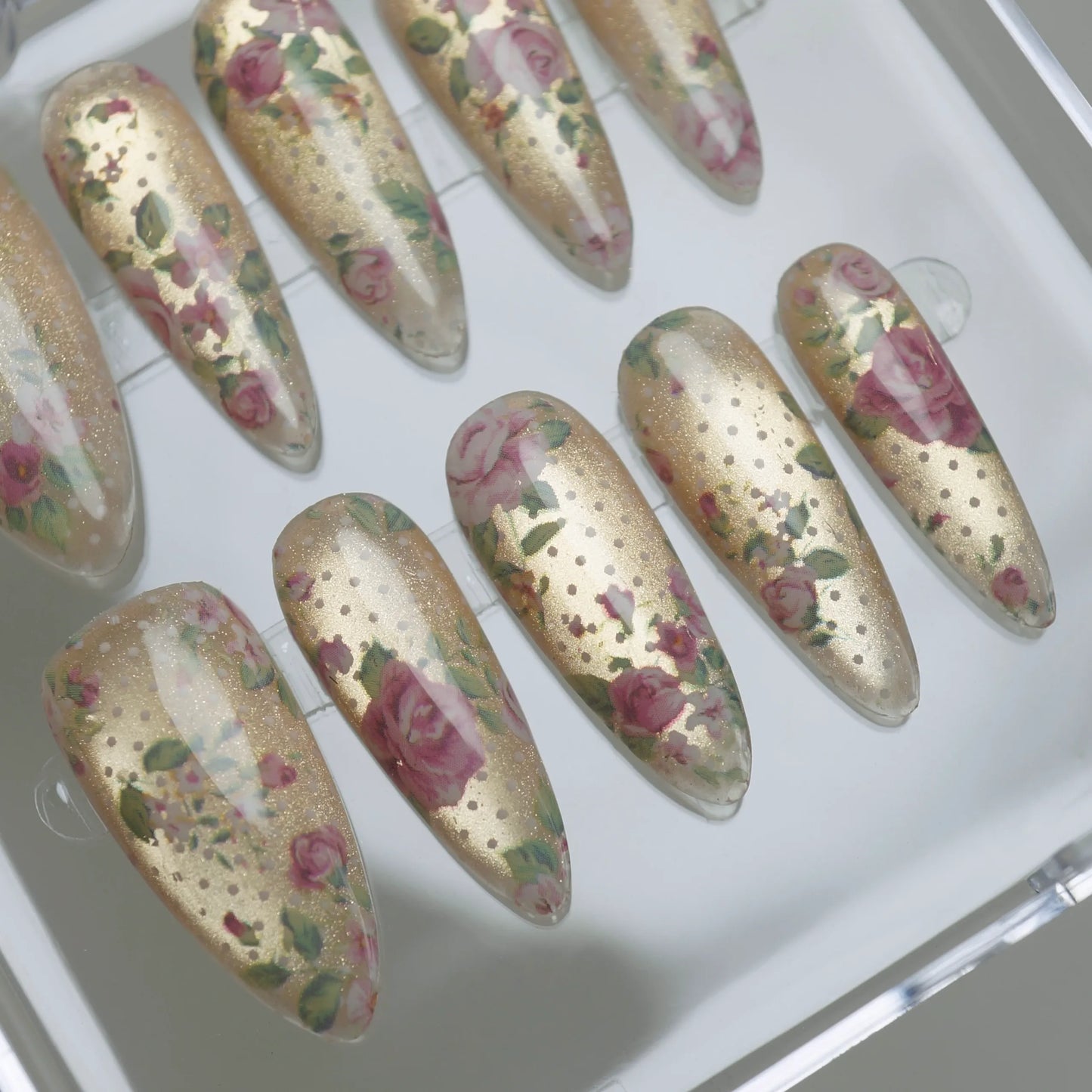 Heirloom Petals close-up detail showing delicate vintage rose print and champagne shimmer on a golden base nail – Donailsart