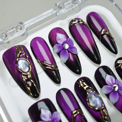 Veloria press-on nail set product view with bold deep amethyst, gold, and gemstone statement nail art by Donailsart
