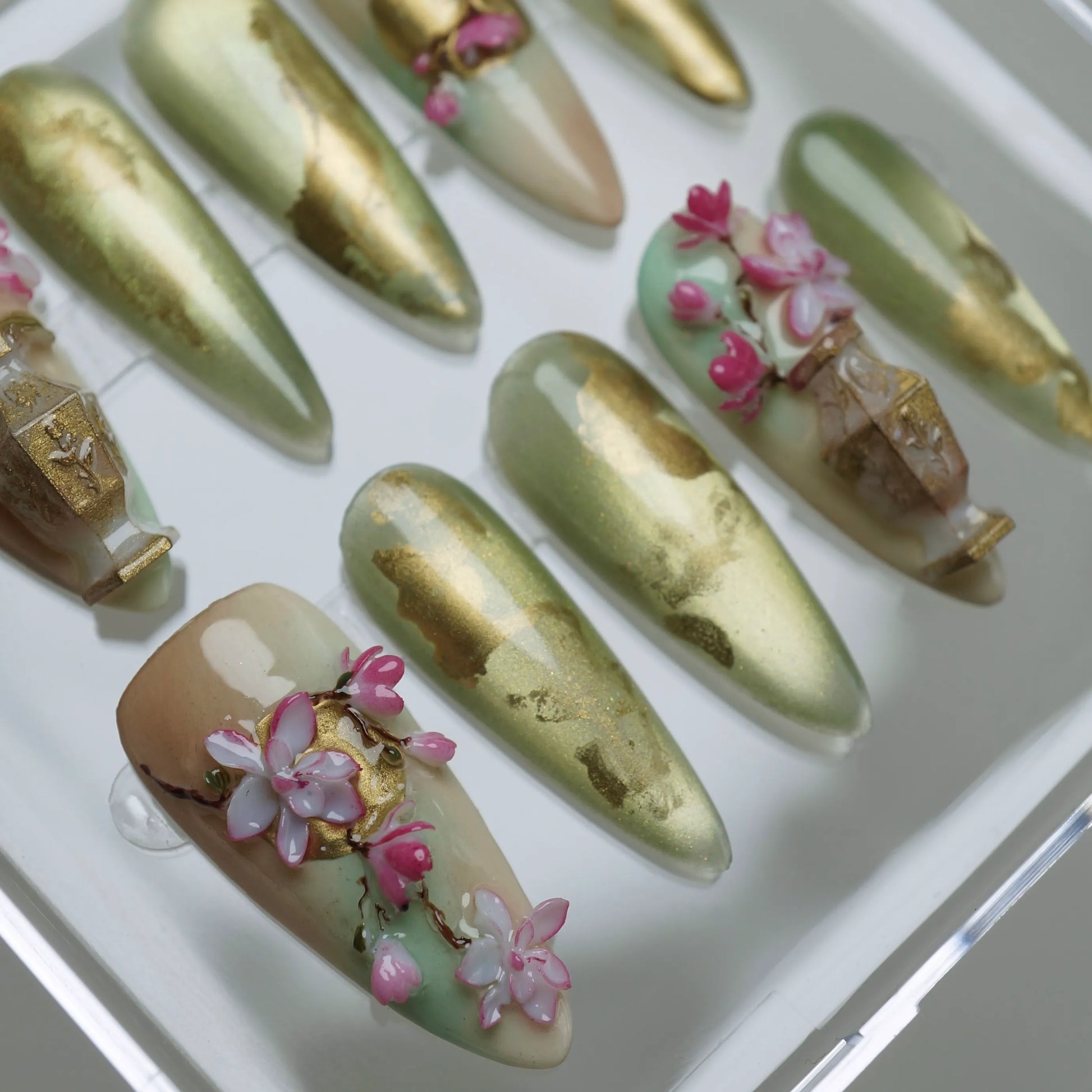 Garden Reverie press-on nails side angle showing elegant jade green and gold sakura spring nail art – Donailsart
