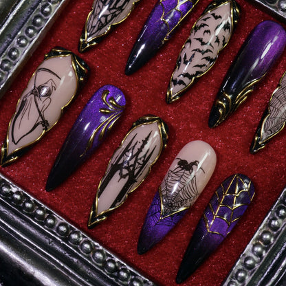 Haunted Hollow press-on nails, close-up of haunted house in gold frames