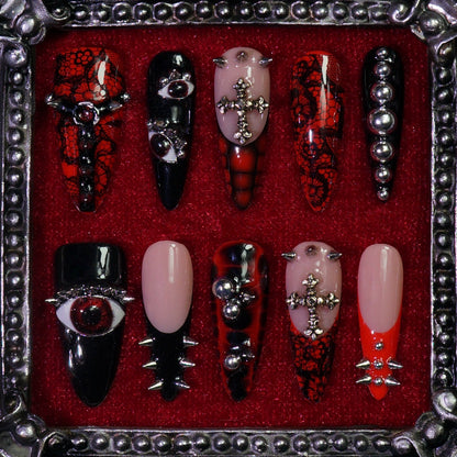 Stained Grace press-on nails: black, nude and red nails with ornate gothic stained-glass style details