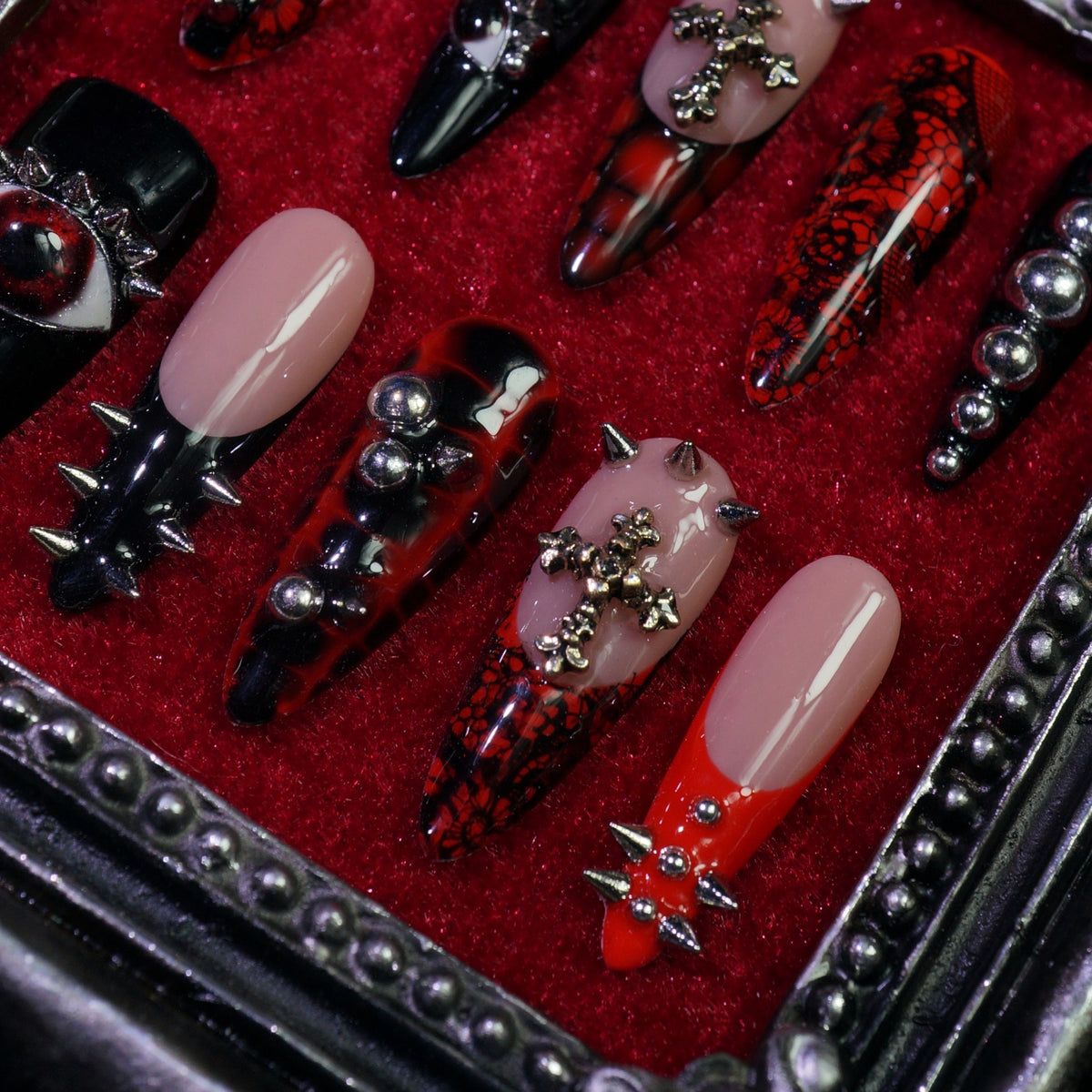 Stained Grace press-on nails, close-up of ornate gothic details