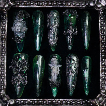 Jade Phantom press-on nails: deep jade green nails with ghostly translucent shimmer and silver details
