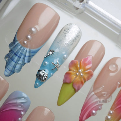 Lushwave nail art detail view featuring ocean blue gradient and tropical floral seaside details – Donailsart