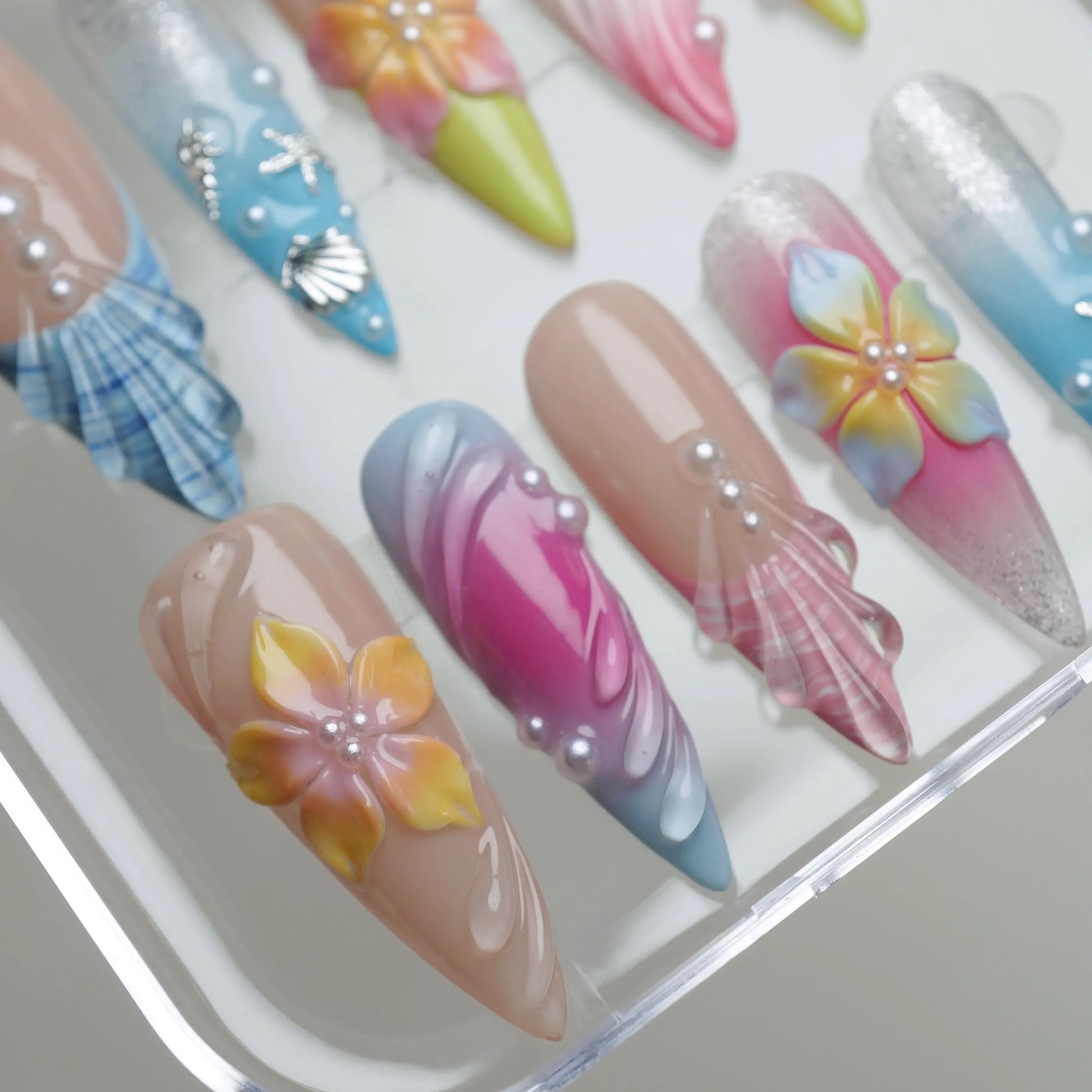 Lushwave press-on nails side angle showing warm tropical sunset and ocean blue summer nail art – Donailsart