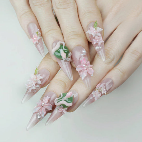 Nails with floral designs on a light background