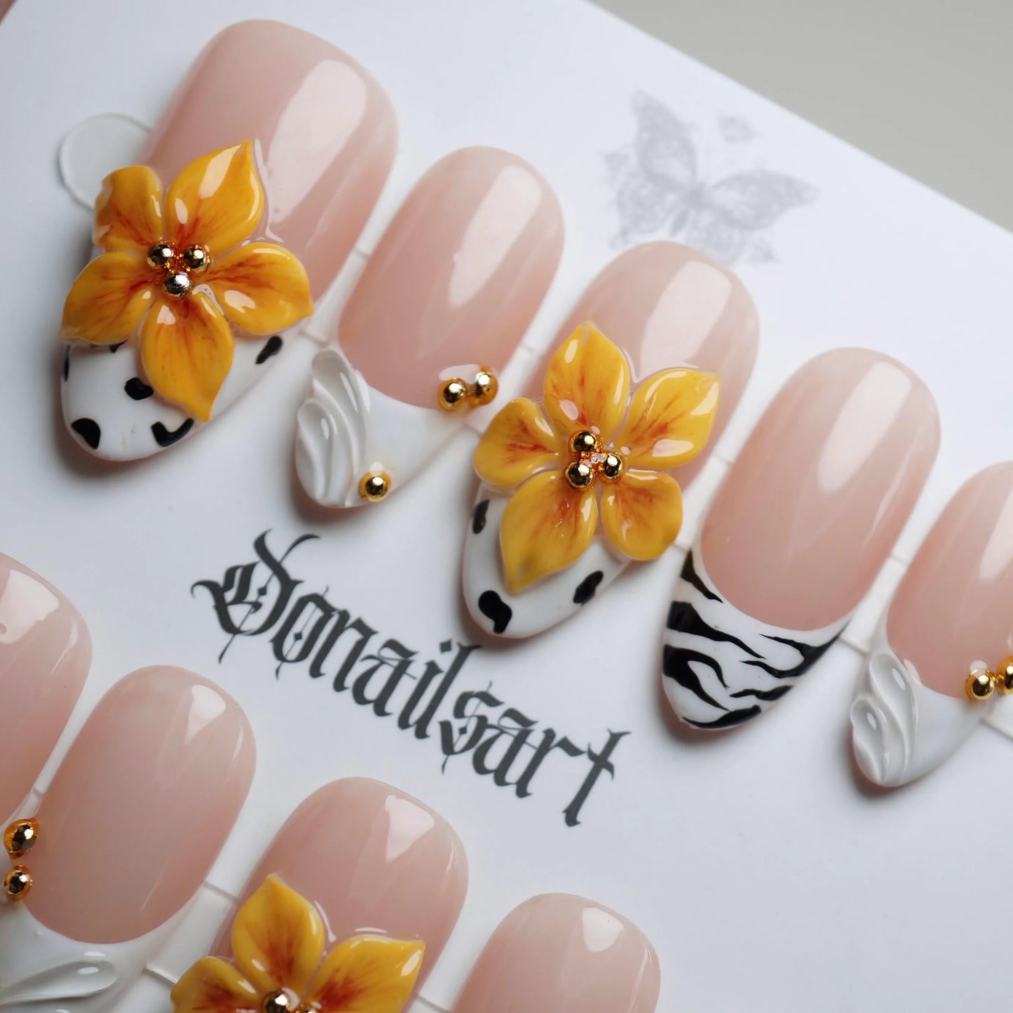 B6 | Honey Bloom close-up detail showing fluid chrome metallic texture on a warm nude and smoky gradient nail – Donailsart