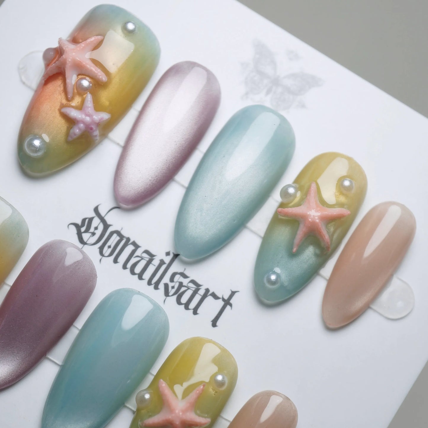 B3 | Pastel Sunset close-up detail showing warm to cool pastel gradient with delicate starfish nail accents – Donailsart