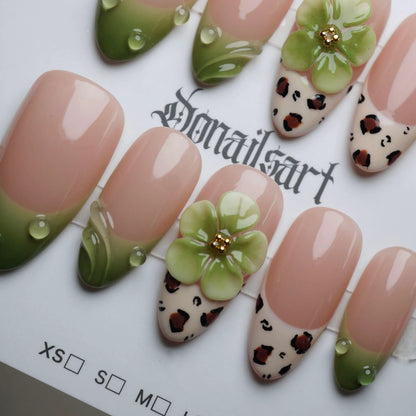 B7 | Palm Kiss close-up detail showing fresh green tips and delicate floral accents on a clean nude nail – Donailsart