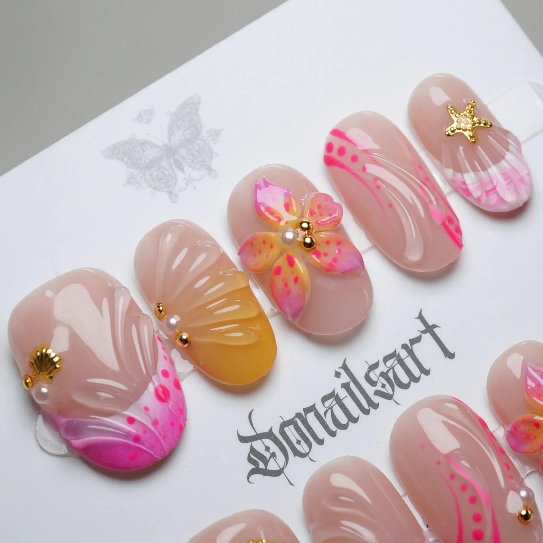 A29 | Sunburst Petals press-on nail set product view with bold hot pink, orange, and gold floral summer nail art by Donailsart