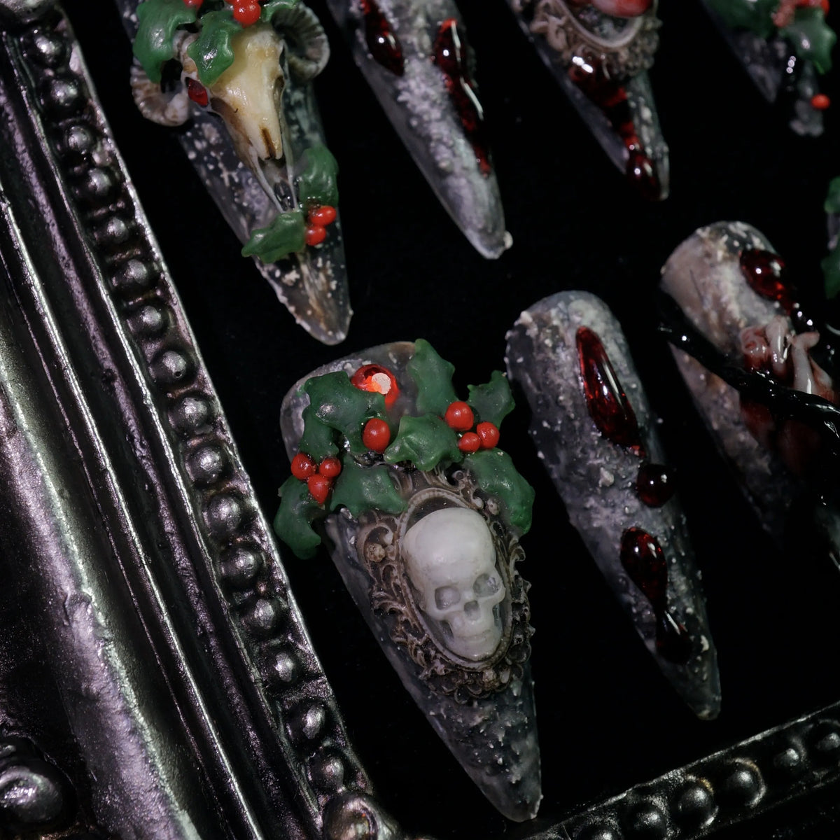Baphomet x Christmas press-on nails, close-up of occult goat skulls and holly