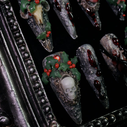 Baphomet x Christmas press-on nails, close-up of occult goat skulls and holly