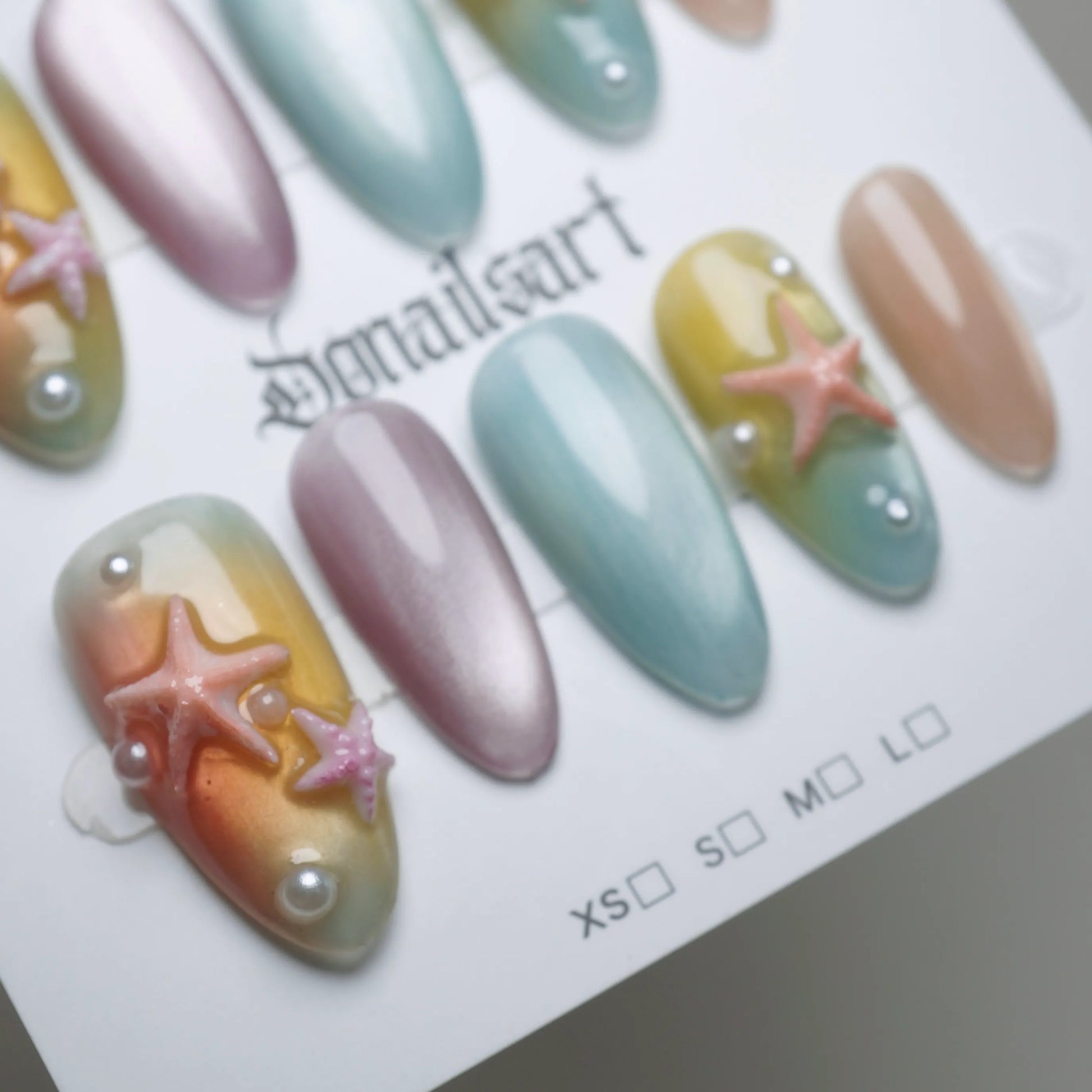 B3 | Pastel Sunset press-on nail set product view with vibrant pastel sunset and ocean blue gradient nail art by Donailsart