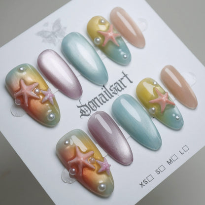 B3 | Pastel Sunset press-on nails on display showing the full pastel sunset gradient nail art collection – Donailsart