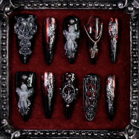 Gothic Chapel press-on nails: red and black nails with silver 3D angels, crosses and gothic frames