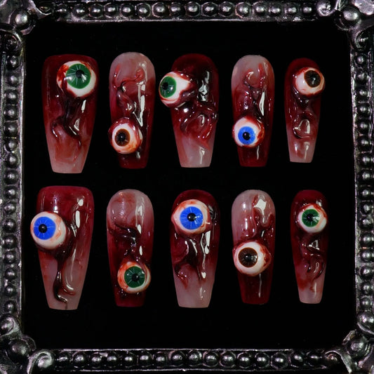 Blood Eyes press-on nails: blood-red nails with 3D eyeballs staring from each nail