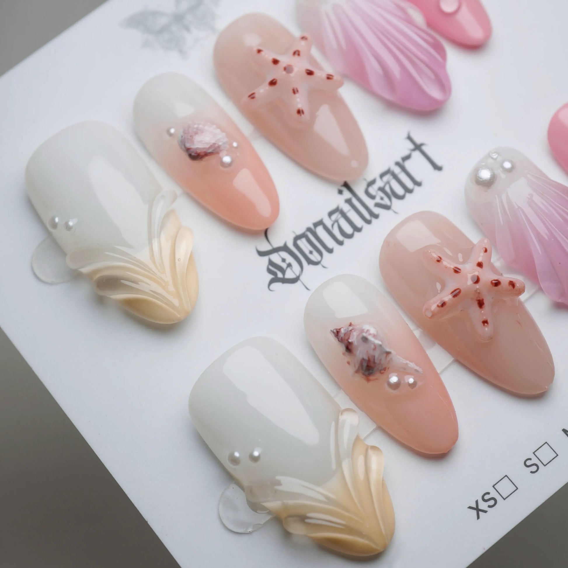 A27 | Pink Taffy Tide nail art detail view featuring glossy pink candy texture and beach shell nail designs – Donailsart