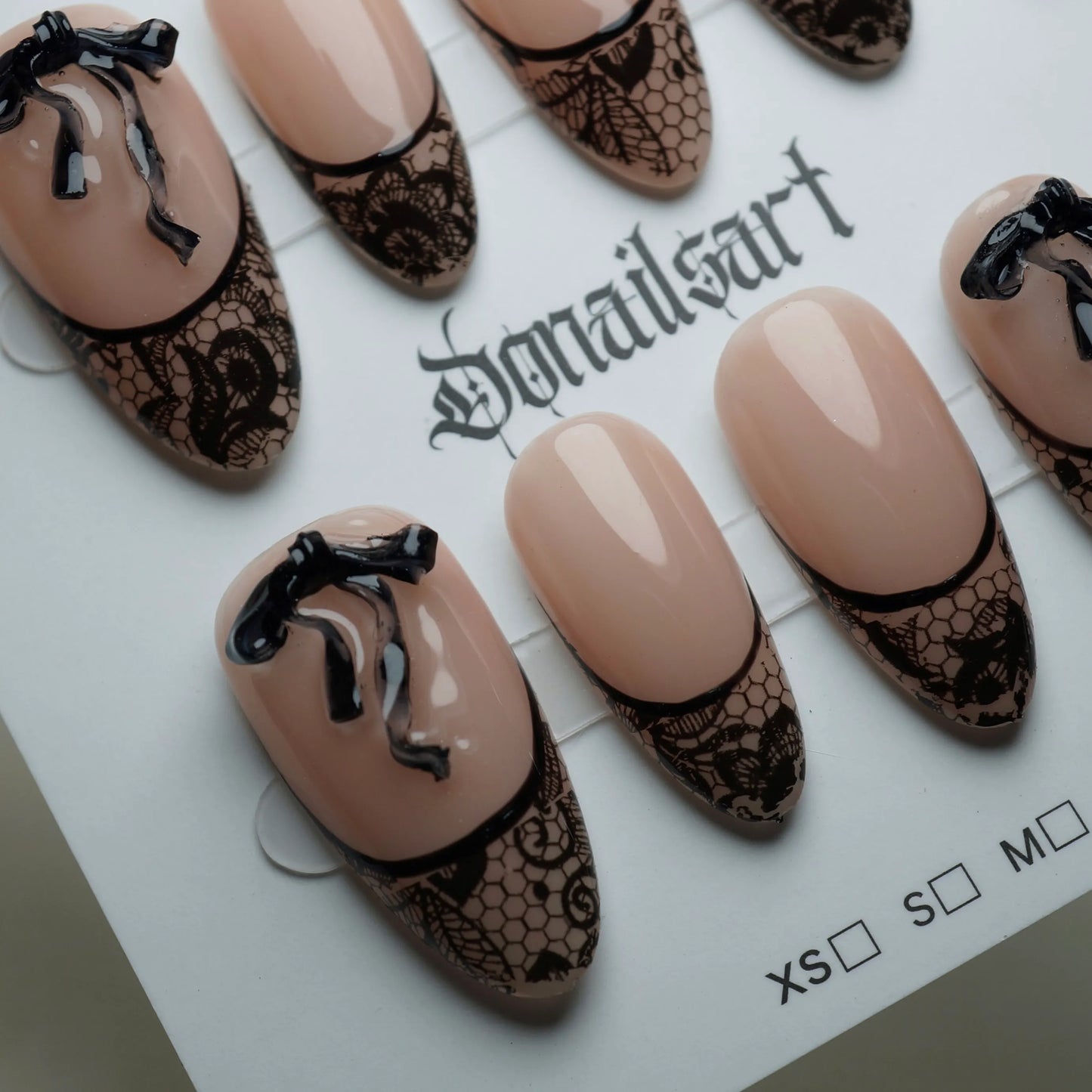 B4 | Sexy Lady press-on nail set product view with elegant sheer nude and black lace ribbon nail art by Donailsart