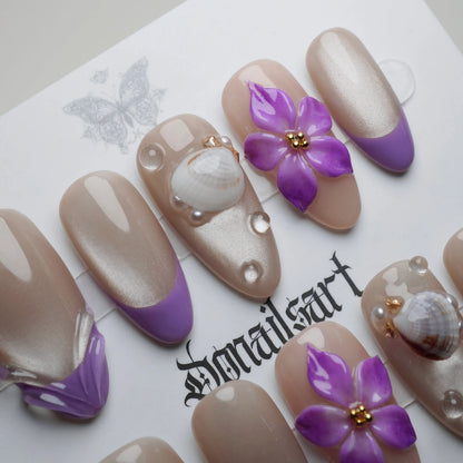 A28 | Violet Shore close-up detail showing violet tip gradient with sculpted petal and water droplet nail accents – Donailsart