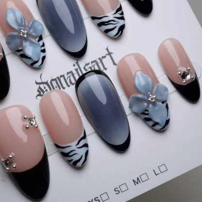 B1 | Velour Static press-on nails on display showing the full blue safari nail art collection – Donailsart