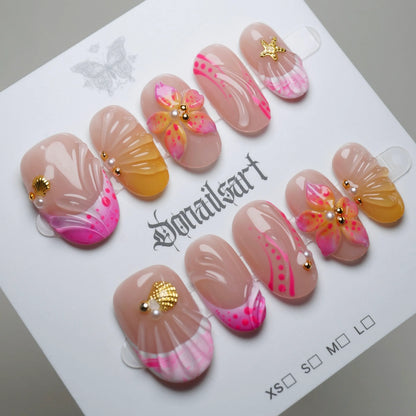 A29 | Sunburst Petals press-on nails on display showing the full hot pink and orange sculpted floral nail art collection – Donailsart