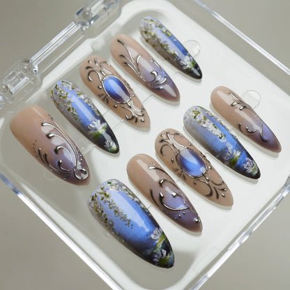 Velour Relic press-on nails on display showing the full blue-violet gradient and chrome nail art collection – Donailsart