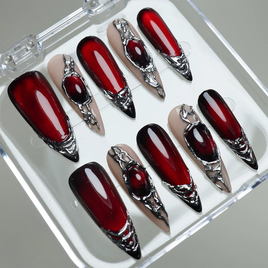 Red Alloy press-on nails on display showing the full crimson and chrome metal nail art collection – Donailsart