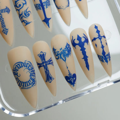 Blue Heresy press-on nail set product view with bold cobalt sacred symbol and graphic nail art by Donailsart